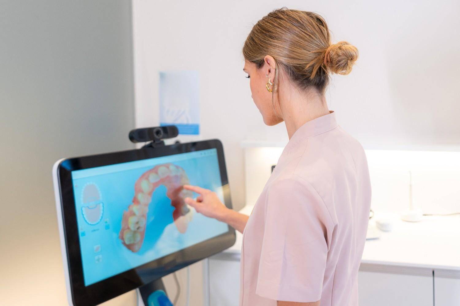 Patient reviewing a digital 3D dental scan